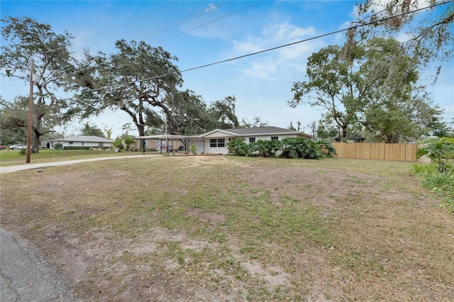 ranch-style house with a carport