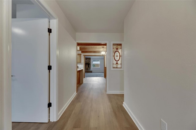 hallway featuring light hardwood / wood-style floors