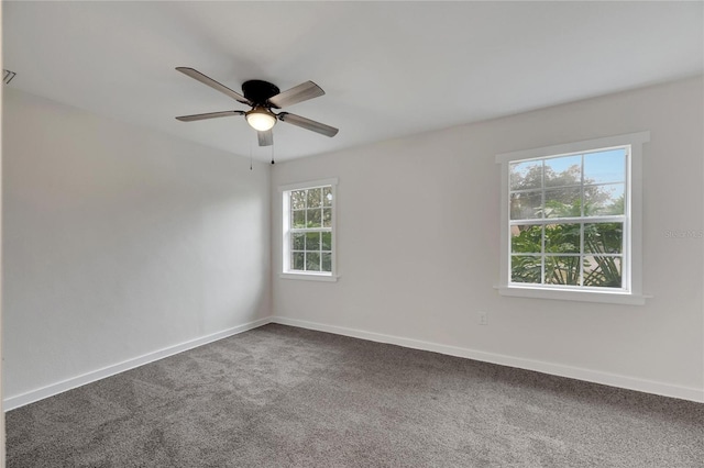 unfurnished room with carpet flooring and ceiling fan