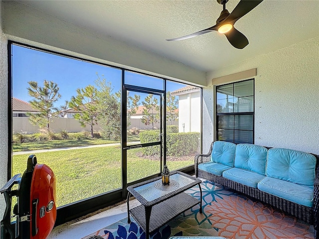 sunroom / solarium with ceiling fan