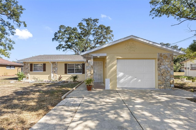 single story home with a garage