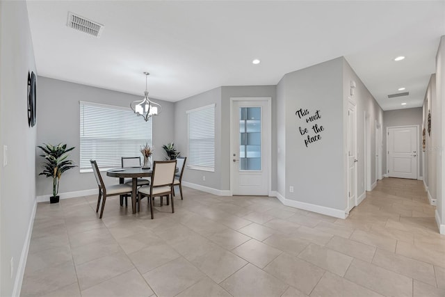 dining room with light tile patterned flooring, recessed lighting, visible vents, baseboards, and an inviting chandelier