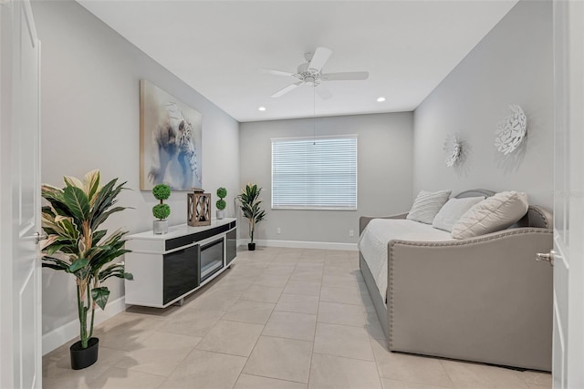 sitting room featuring recessed lighting, baseboards, a ceiling fan, and light tile patterned flooring