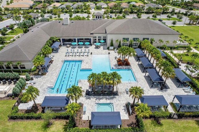 view of swimming pool with a residential view