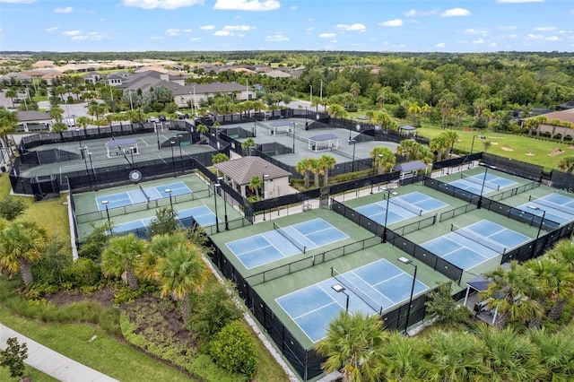 birds eye view of property with a residential view