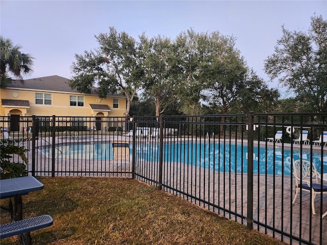 view of swimming pool with a patio