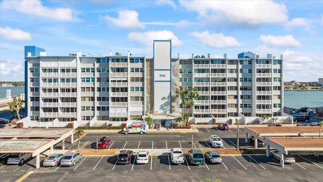 view of property with a water view