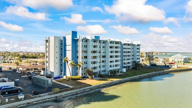 view of property with a water view