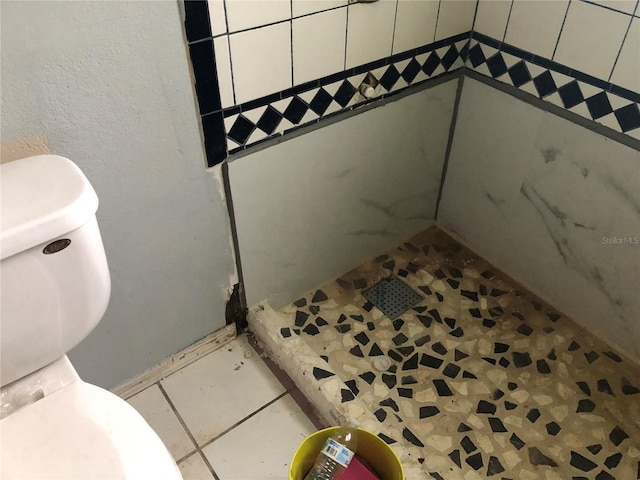 bathroom with tile patterned flooring