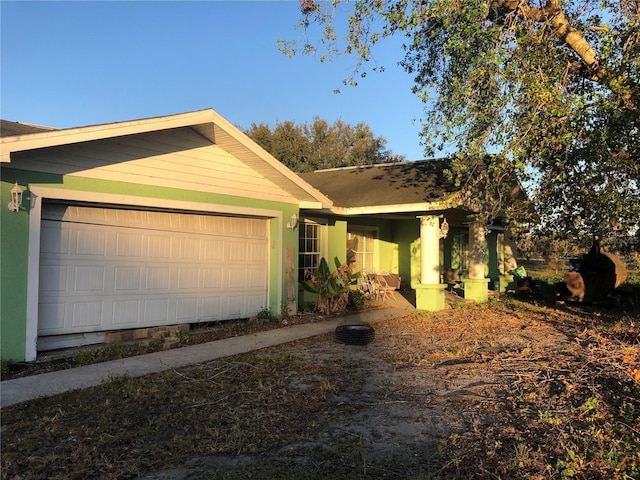 ranch-style house featuring a garage