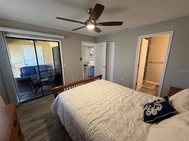 bedroom featuring access to exterior, ceiling fan, ensuite bath, and dark hardwood / wood-style floors