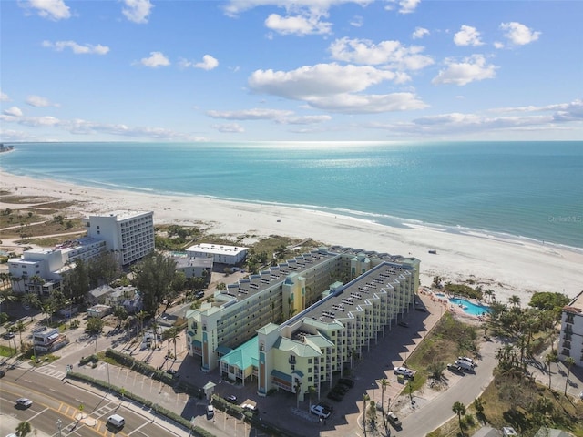 aerial view featuring a view of the beach and a water view