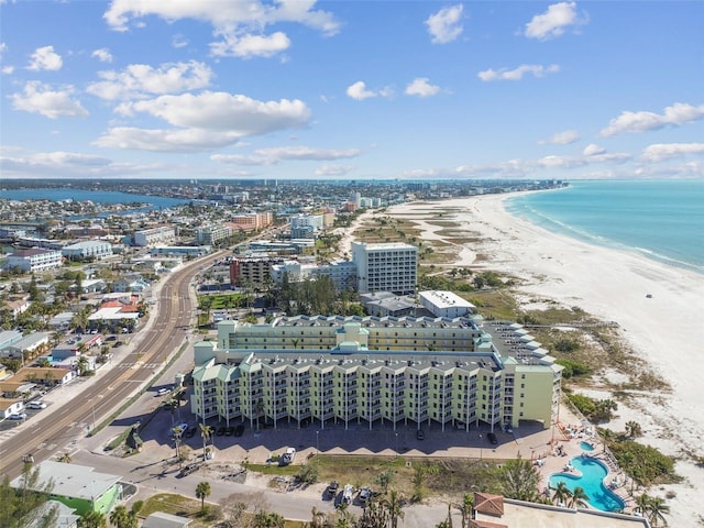 birds eye view of property featuring a view of the beach and a water view