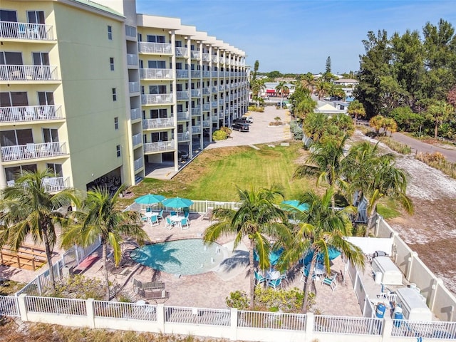 view of property featuring a community pool