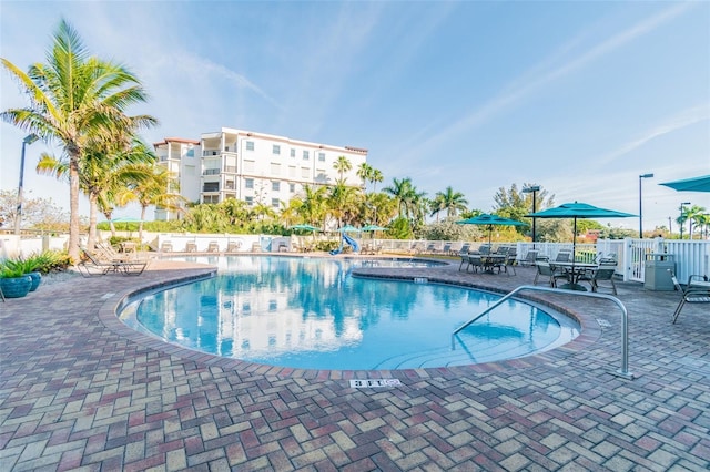 view of pool featuring a patio