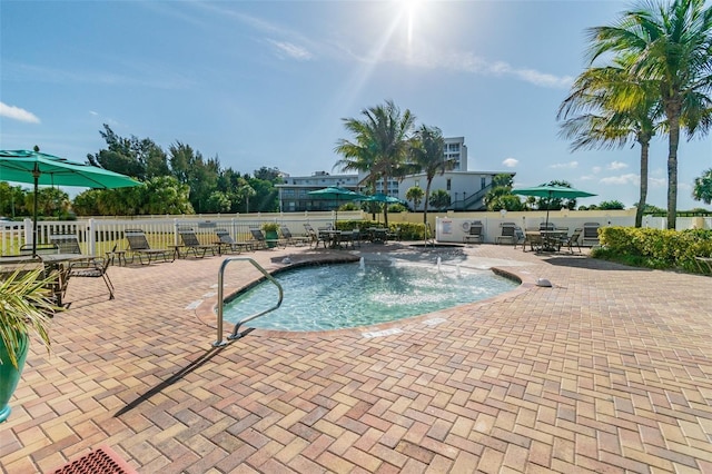 12000 Gulf Blvd Unit 208-S, Treasure Island, FL 33706 - community pool featuring a patio and outdoor dining space