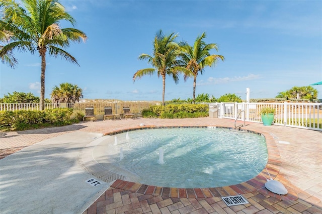 12000 Gulf Blvd Unit 208-S, Treasure Island, FL 33706 - community pool with a patio area