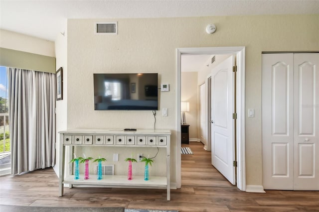 12000 Gulf Blvd Unit 208-S, Treasure Island, FL 33706 - living room with wood finished floors