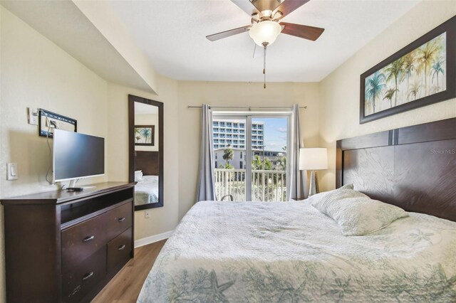 12000 Gulf Blvd Unit 208-S, Treasure Island, FL 33706 - bedroom with wood finished floors, access to outside, and ceiling fan