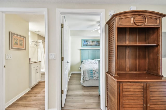 12000 Gulf Blvd Unit 208-S, Treasure Island, FL 33706 - corridor with light wood-type flooring and baseboards