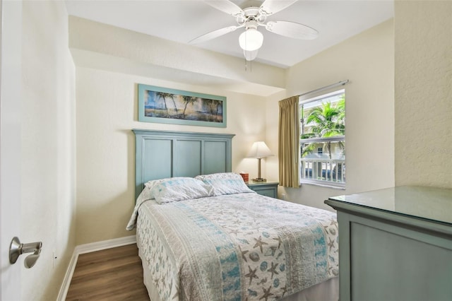 12000 Gulf Blvd Unit 208-S, Treasure Island, FL 33706 - bedroom with dark wood-style floors and a ceiling fan