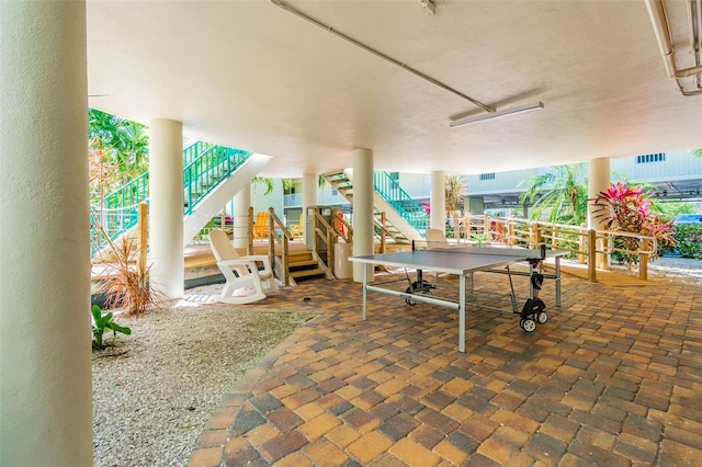 12000 Gulf Blvd Unit 208-S, Treasure Island, FL 33706 - view of patio / terrace with stairs