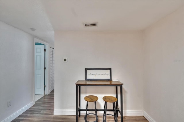 interior space with dark wood-type flooring