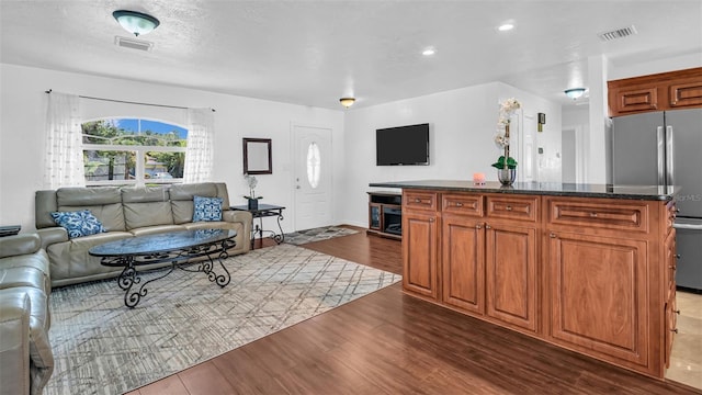 living room featuring dark hardwood / wood-style floors