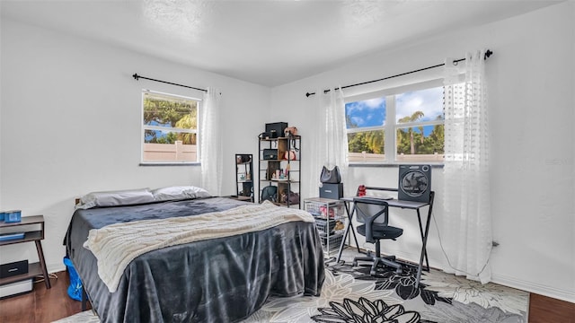 bedroom featuring hardwood / wood-style floors