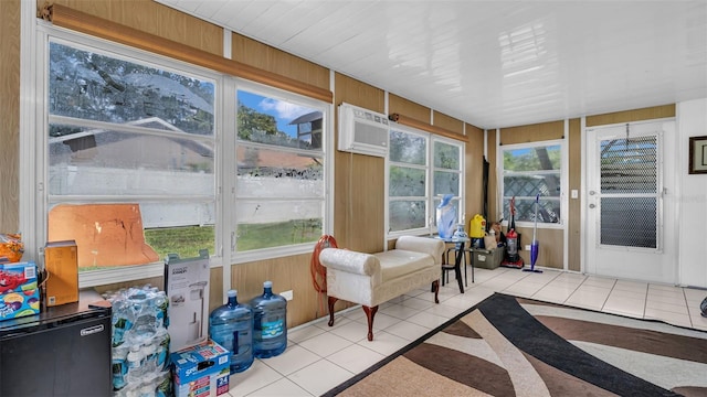 sunroom with an AC wall unit