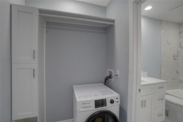 washroom featuring washer / clothes dryer