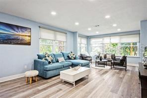 living room featuring a healthy amount of sunlight and light wood-type flooring