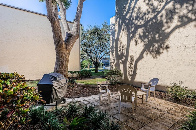 view of patio with a grill