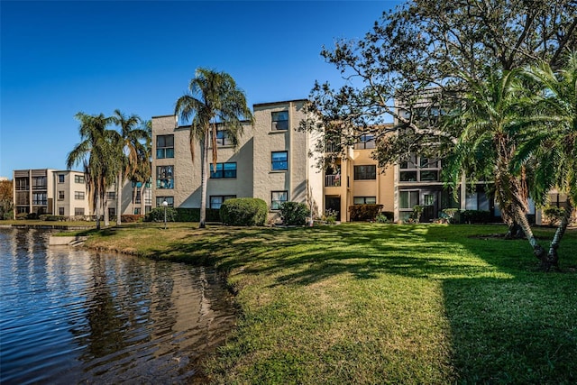 view of building exterior with a water view