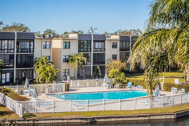 view of swimming pool with a patio area