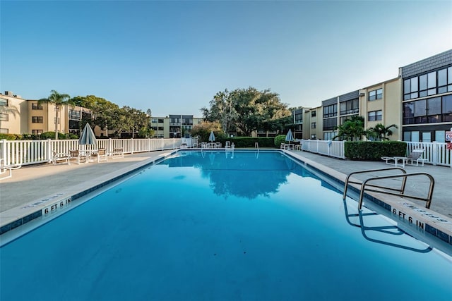 view of pool featuring a patio area