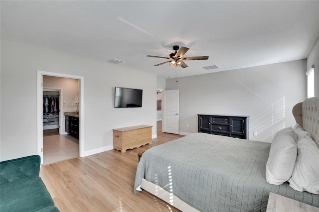 bedroom featuring hardwood / wood-style floors and ceiling fan