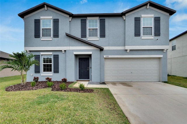 view of front property with a front yard and a garage