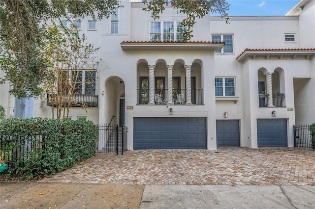 mediterranean / spanish house featuring a garage