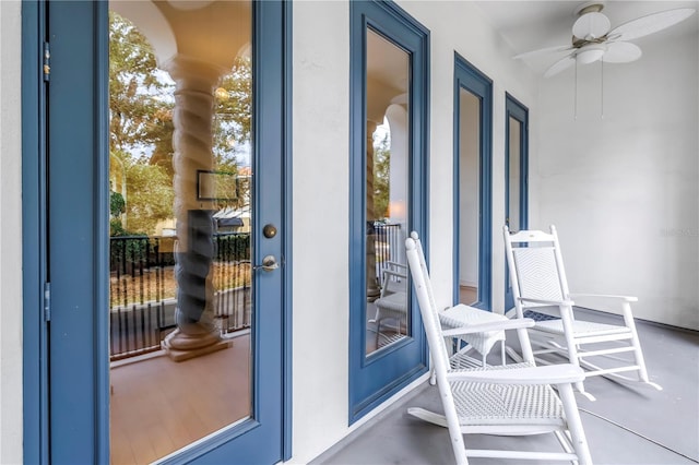 balcony featuring ceiling fan