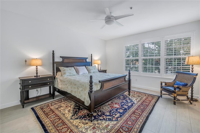 bedroom featuring light hardwood / wood-style floors and ceiling fan