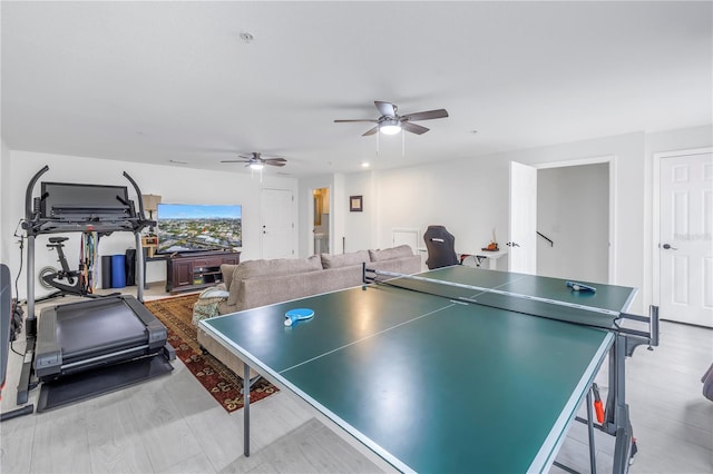 playroom featuring ceiling fan and light wood-type flooring