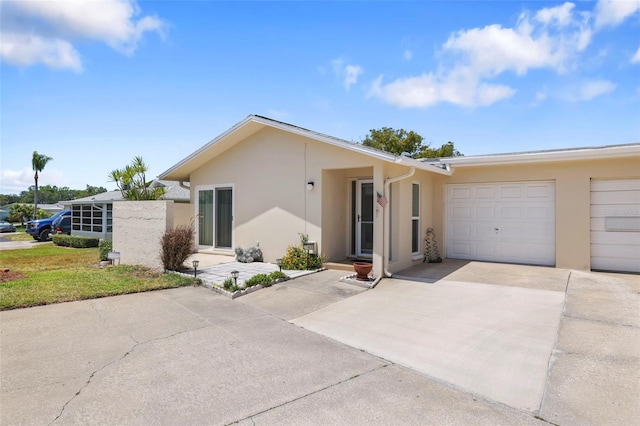 ranch-style home with a garage