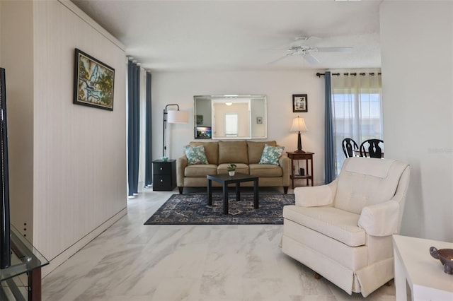 2740 Highlands Blvd Unit D, Palm Harbor, FL 34684 - living area with healthy amount of natural light, a ceiling fan, and marble finish flooring