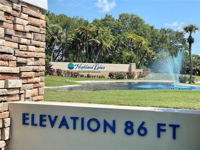 2740 Highlands Blvd Unit D, Palm Harbor, FL 34684 - community sign with a yard