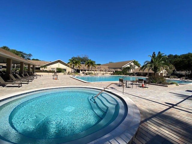 view of pool featuring a patio