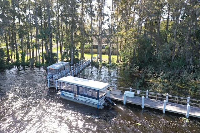 2740 Highlands Blvd Unit D, Palm Harbor, FL 34684 - dock featuring a water view