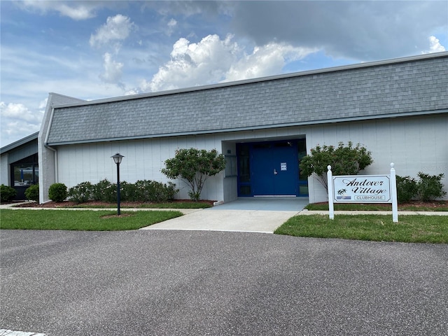 2740 Highlands Blvd Unit D, Palm Harbor, FL 34684 - view of building exterior with concrete driveway