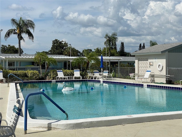 view of swimming pool with a patio