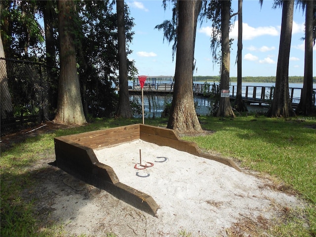 2740 Highlands Blvd Unit D, Palm Harbor, FL 34684 - view of green lawn featuring a water view